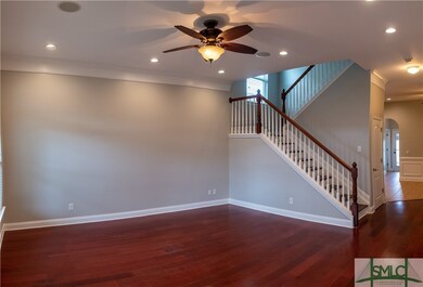 Family room with hardwood floors