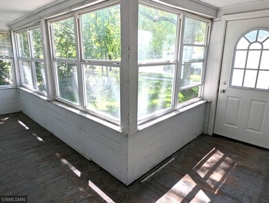 Front porch with all windows.