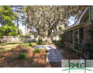 Patio/Deck. Screened porch with patio area