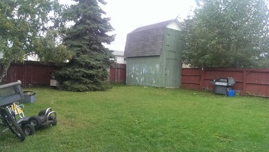 Backyard with storage shed
