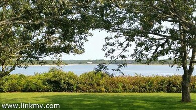 Chilmark side Great Pond access.  Launch a kayak or take a dip from your own private beach.