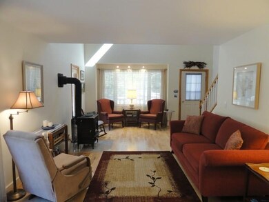 View of living room with mill...