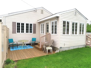 Sunroom with patio area