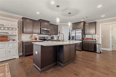 Kitchen with large island and open to the main liv