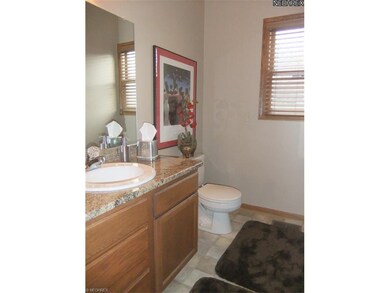 A half bathroom and separate first floor laundry r