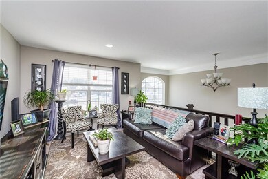 Versatile loft is filled with light from large windows and open foyer.