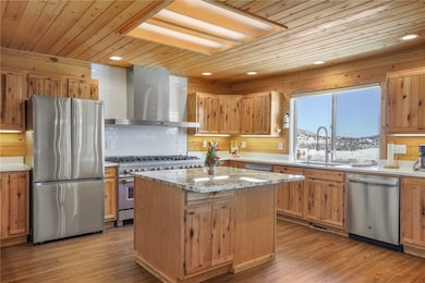 Kitchen with appliances with stainless steel finis