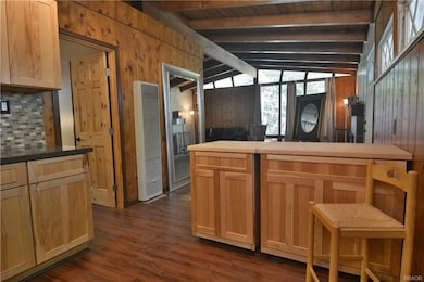 Bedroom and bath to the right of kitchen counter