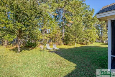 Nice back yard with tree line buffer