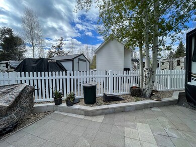 Bricked Patio With Garden Area Awaits