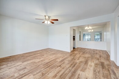 Spacious living room that opens into the dining ro