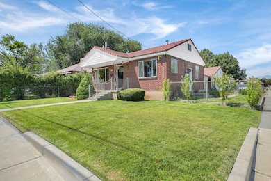 Bungalow-style house featuring brick siding and covered porch
