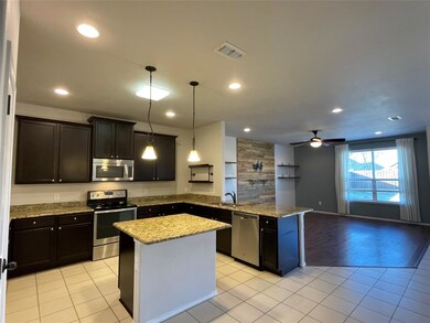 Large open kitchen with island and cabinet space