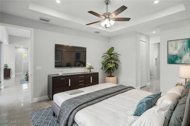 Bedroom with recessed lighting, visible vents, bas