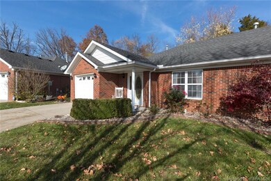 Brick with covered front porch.