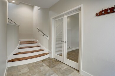Entry area connects the garage, first-floor bedroo