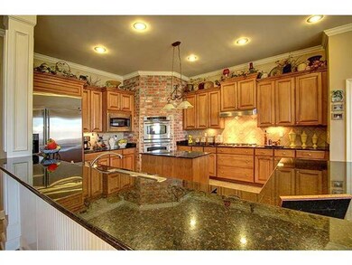 Kitchen. Gourmet delight with brick, granite,  5 b