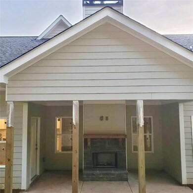 Covered Rear Patio with Outdoor Fireplace