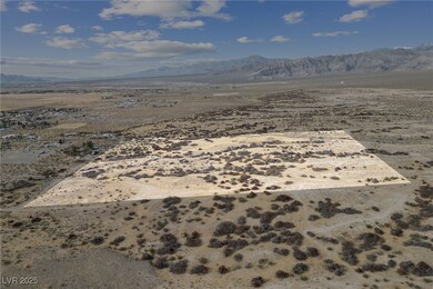 Mountain view with a rural view and view of desert