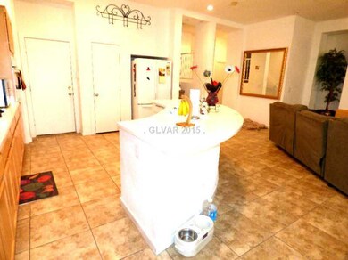 Kitchen. kitchen island with pantry and leading to