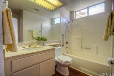 The guest bathroom features new plumbing fixtures 