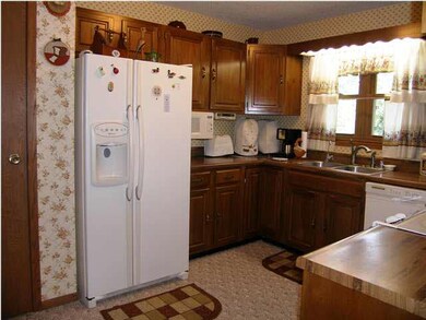 The east wall of the kitchen with the pantry just 