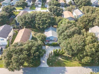 Nestled in live oak trees.