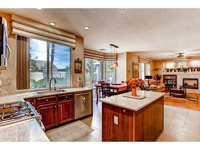 Kitchen. Quartz counters, tile floor.