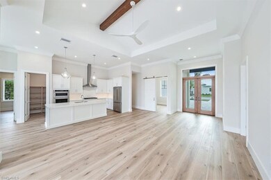 The open concept great room, kitchen, and dining a