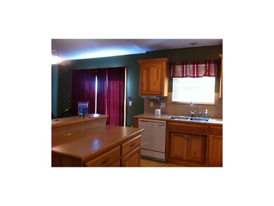 Door of Dining room leads to deck overlooking priv