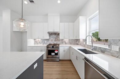 Quartz countertops, designer tile and soft close s