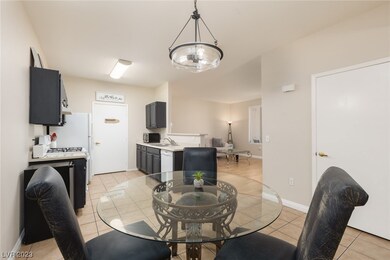 The dining room offers easy access to the kitchen