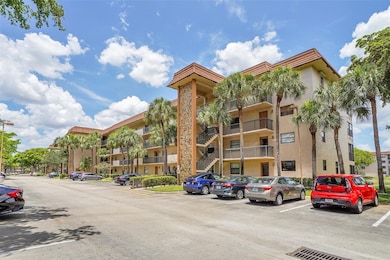 4950 E Sabal Palm Blvd unit 302, Tamarac, FL 33319 - photo 2