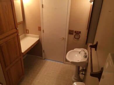 Owners Bath features extra cabinets and vanity area