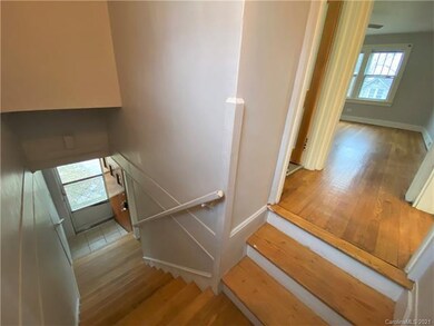 Staircase connects the two levels.