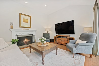 Living Room has Wood Burning Fireplace