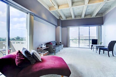 The living and dining room boasts high ceilings, also part of the recent renovation, which play off the light and airy feel that the sliding doors/large windows provide to the space.