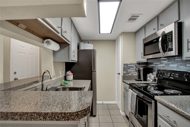 New painted cabinets, fresh backsplash tile, all s