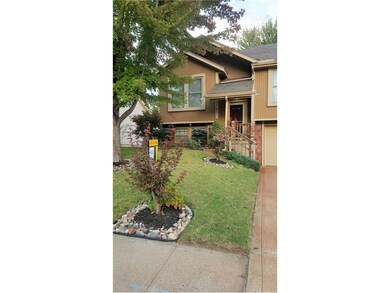 Lovely landscaping greet guests and neighbors.