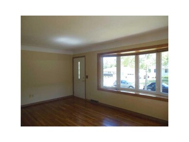 Living Room. Large bay window, awesome hardwood fl
