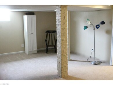 Basement family room measures in at 13x20.