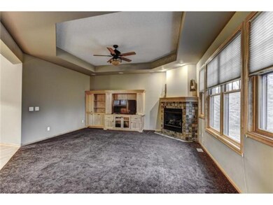 Spacious and light-filled Living Room has built-in