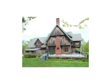 Exterior Front. View of back yard.