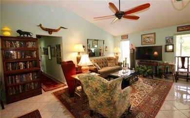 Living room with hallway to bedrooms