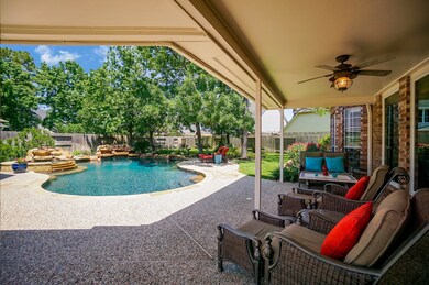 You've got gorgeous, easy-care, serviceable flooring in your spectacular covered patio/backyard. So, just take a stroll to the steps of the pool or dive in, for total relaxation.