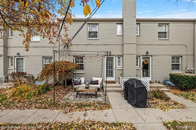 Back of house featuring a patio area, and an outdoor hangout area