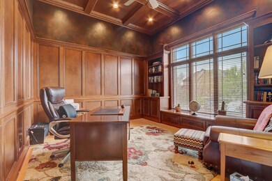 Executive Office with 10 Foot Ceilings and Built in Bookcases
