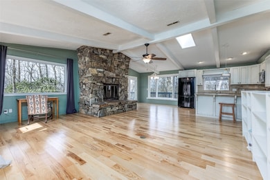 Great room with stone fireplace