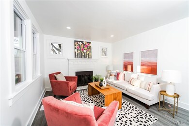 Living room featuring wood-type flooring and a bri