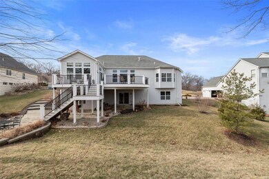 Rear elevation is magnificent with the Sunroom, ba
